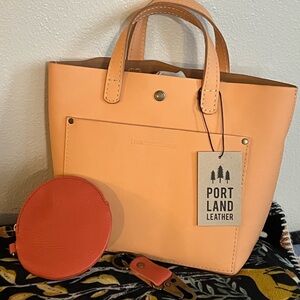Portland Leather Mami mini crossbody tote and coral circle and keychain